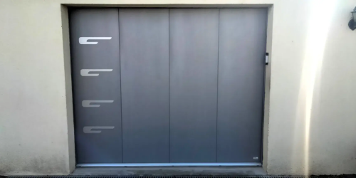 Pose d'une porte de garage sectionnelle plafond