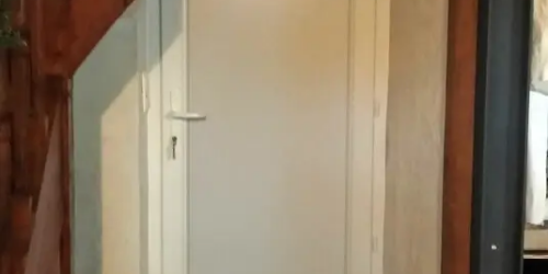 Remplacement d'une porte de communication entre le garage et la maison